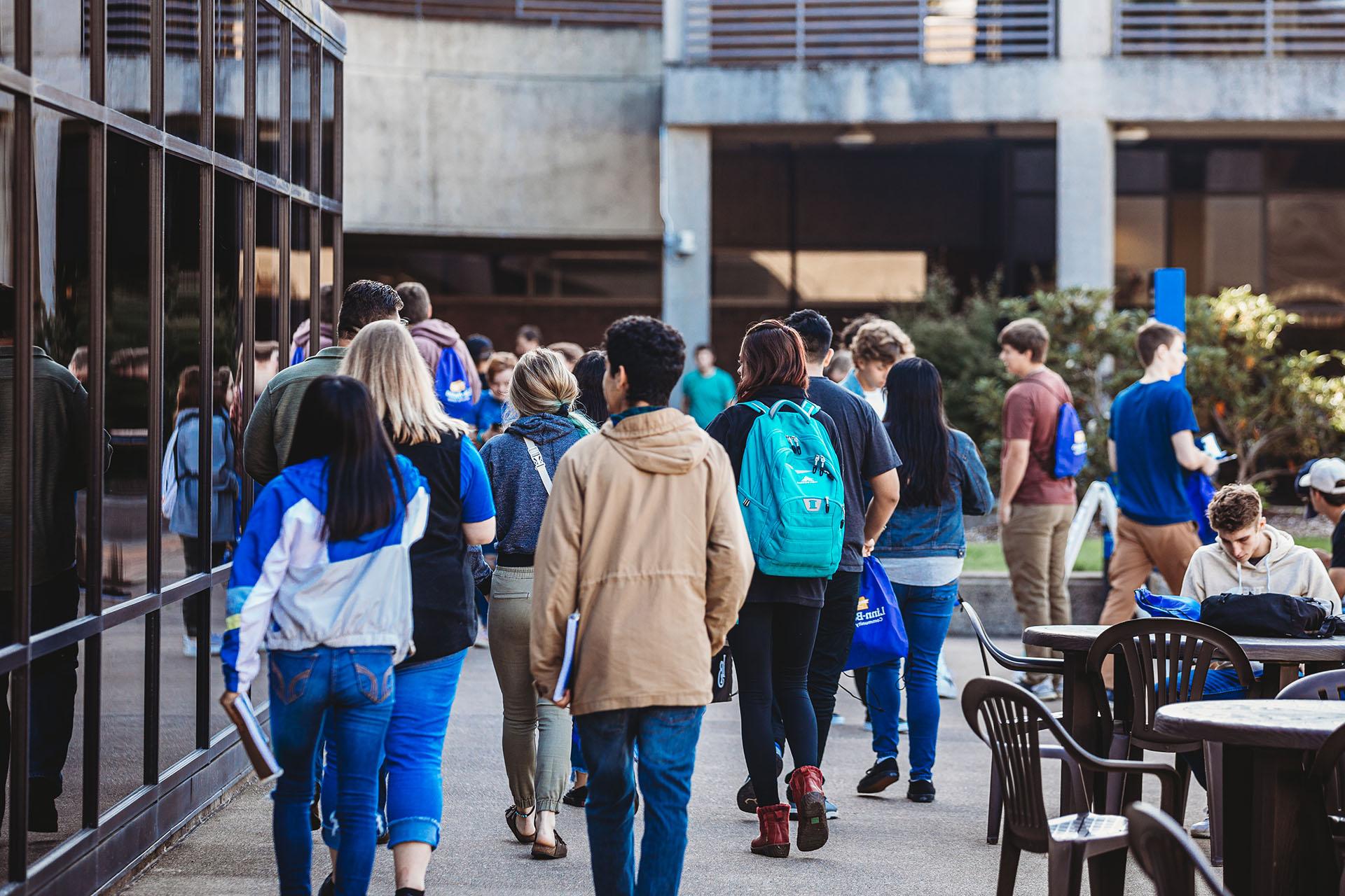 photo of students walking on campus